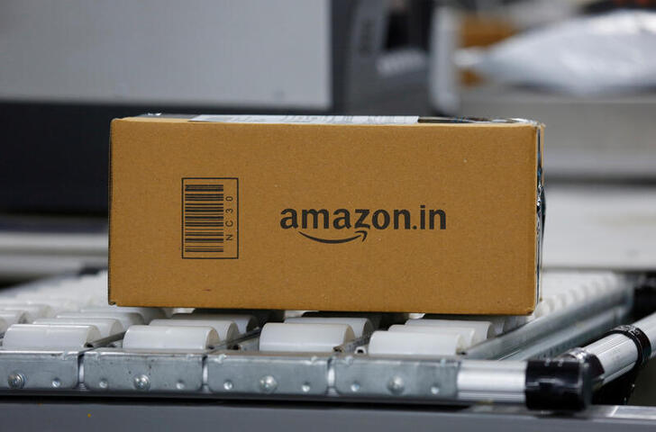 FILE PHOTO: A shipment moves on a conveyor belt at an Amazon Fulfillment Centre (BLR7) on the outskirts of Bengaluru, India, September 18, 2018. REUTERS/ Abhishek N. Chinnappa/File Photo