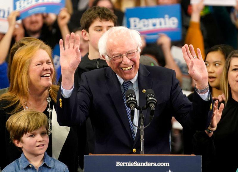 Democratic U.S. presidential candidate Senator Bernie Sanders is accompanied by his wife Jane O’Meara Sanders and other relatives as he speaks at his New Hampshire primary night rally in Manchester, N.H., U.S., February 11, 2020. REUTERS/Rick Wilking
