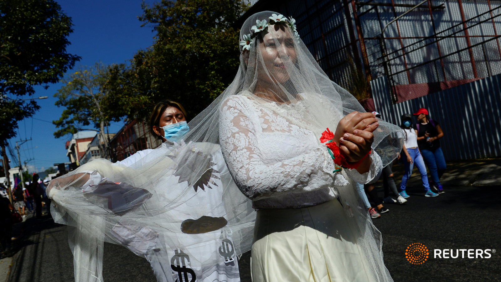 Women take part in a march ahead of International Women’s Day, in San Salvador