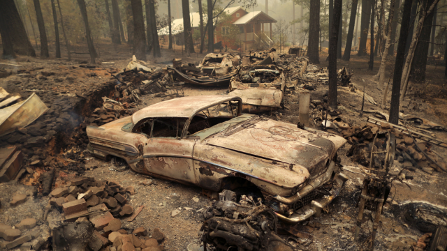 Vehicles destroyed by Dixie Fire are seen in Indian Falls, California