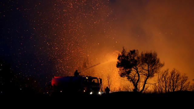 Wildfires rage across Greece