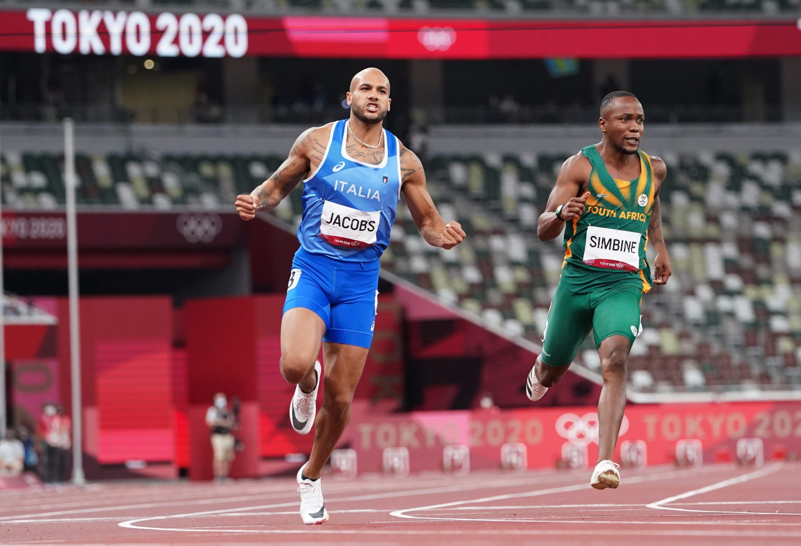 Lamont Marcell Jacobs of Italy crosses the line to win gold REUTERS/Lucy Nicholson