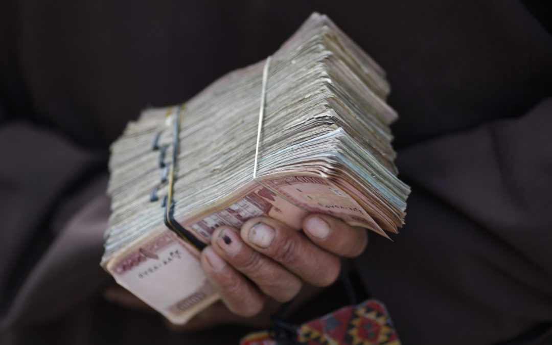 Exclusive-Taliban launch charm offensive with Afghan banks amid funding fears