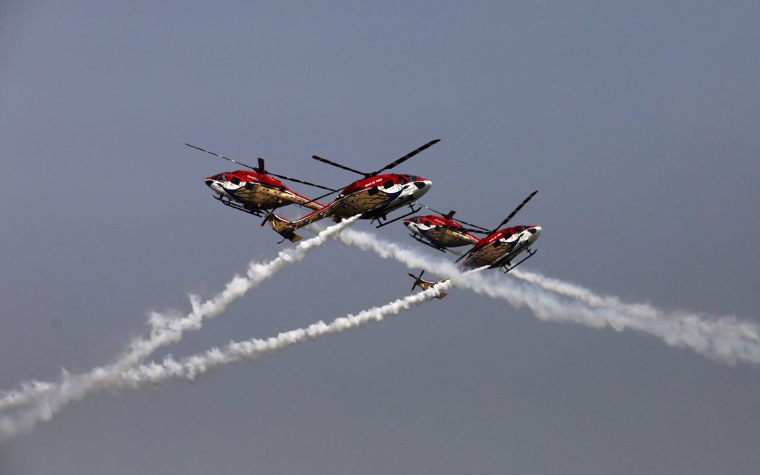 Indian Air Force (IAF) Advanced Light Helicopter (ALH) ‘Sarang’ team performs during the 89th Air Force Day parade, at Hindon Air Force Station in Ghaziabad