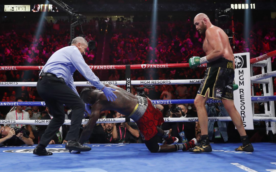 Boxing-Fury defeats Wilder with 11th round knockout to retain WBC title