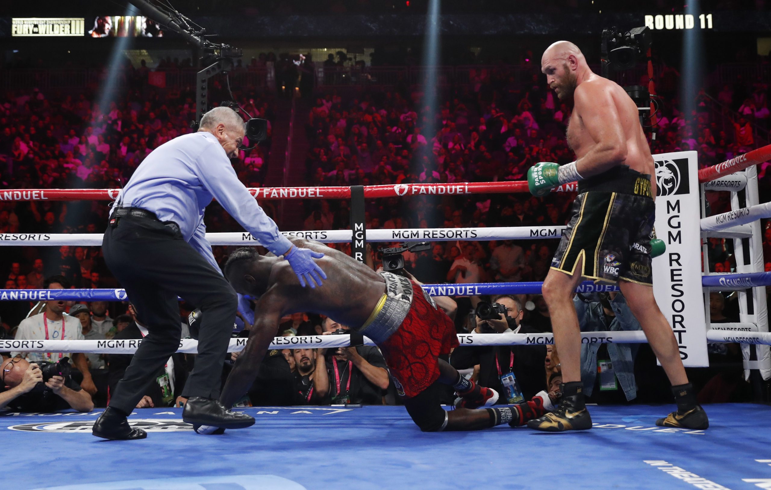 Boxing-Fury defeats Wilder with 11th round knockout to retain WBC title