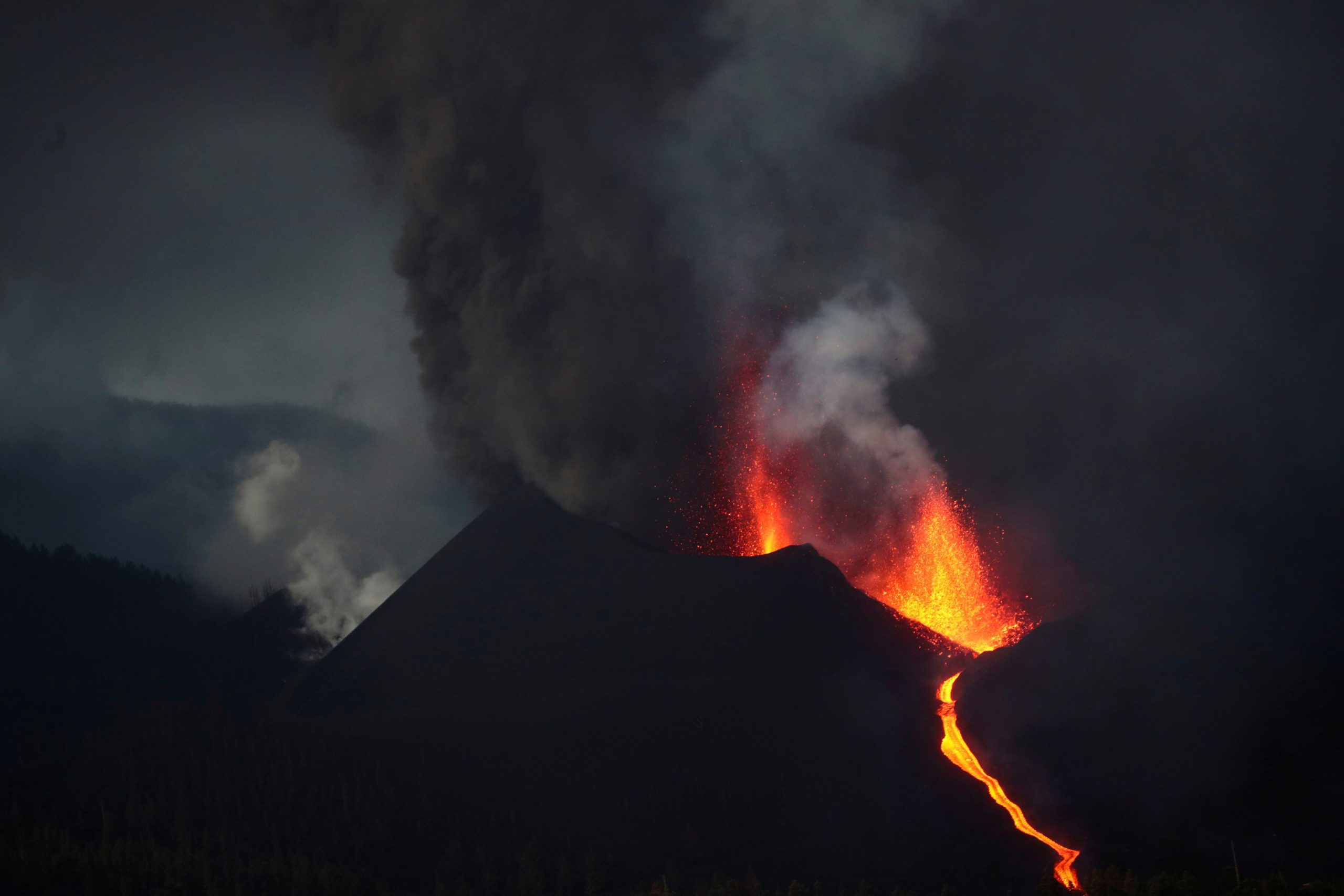 Hundreds evacuated as red-hot lava threatens homes in Spain’s La Palma