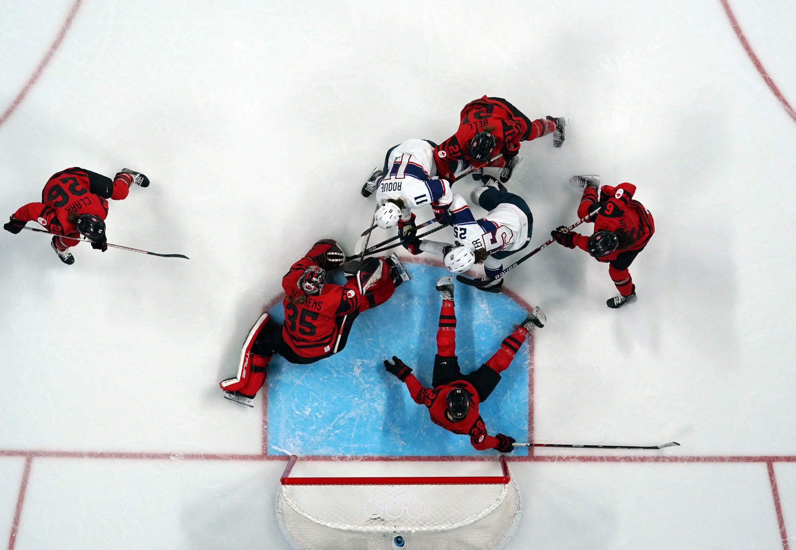 Olympics-Ice hockey-Canada enjoy sweet revenge on U.S