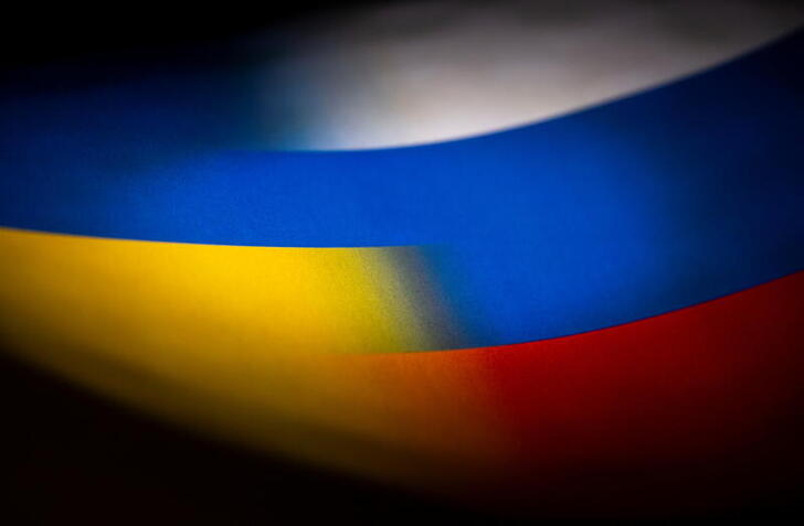 Russia's and Ukraine's flags are seen printed on paper in this illustration taken January 27, 2022. REUTERS/Dado Ruvic/Illustration