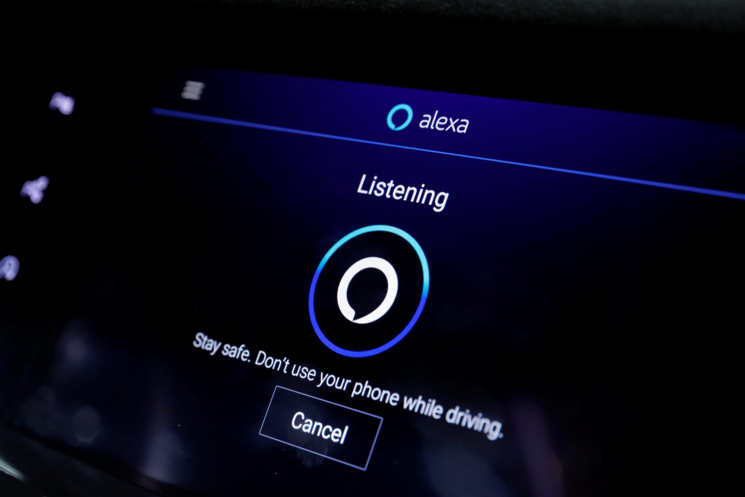 FILE PHOTO: A screen in a Cadillac XT6 SUV displays Alexa on the infotainment system at the Amazon booth during the 2020 CES in Las Vegas, Nevada, U.S. January 7, 2020. REUTERS/Steve Marcus/File Photo