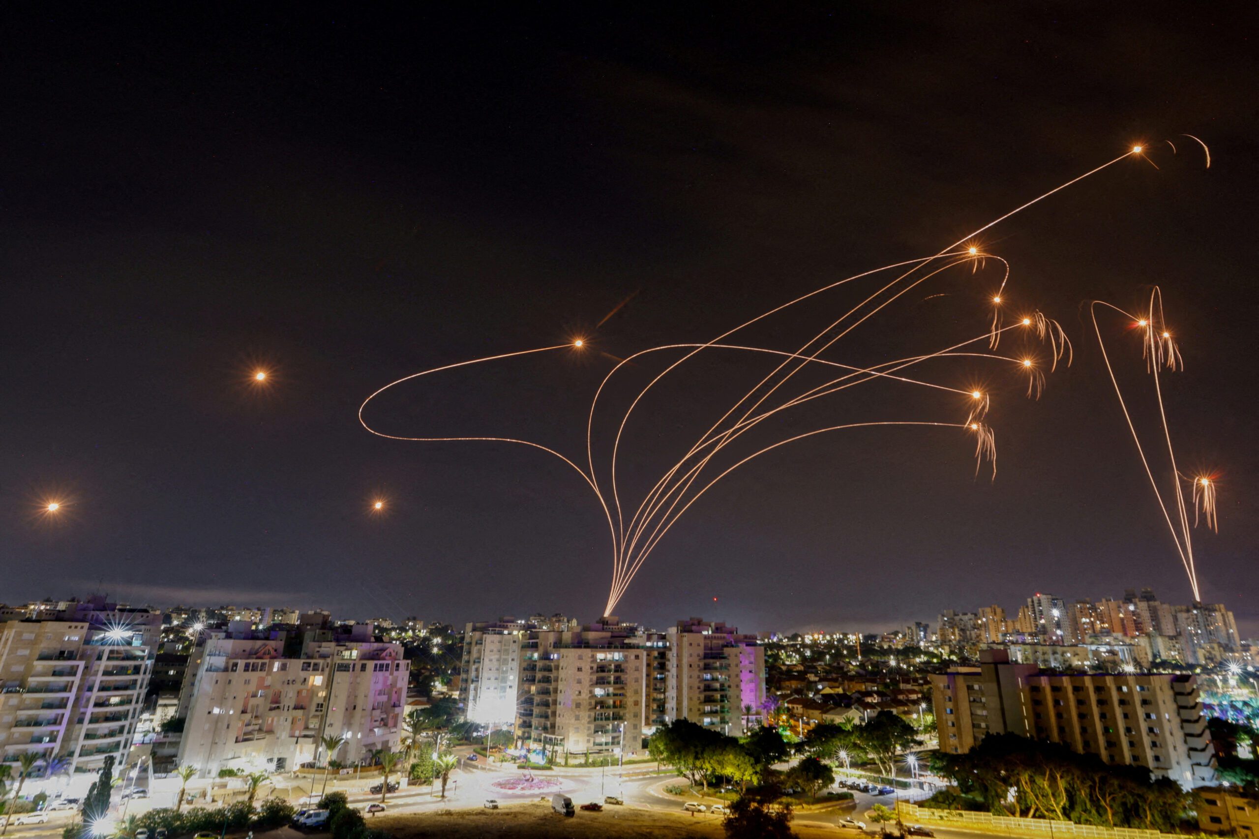 Israel's Iron Dome anti-missile system intercepts rockets launched from the Gaza Strip, as seen from the city of Ashkelon, Israel, October 9, 2023. REUTERS/Amir Cohen      SEARCH 