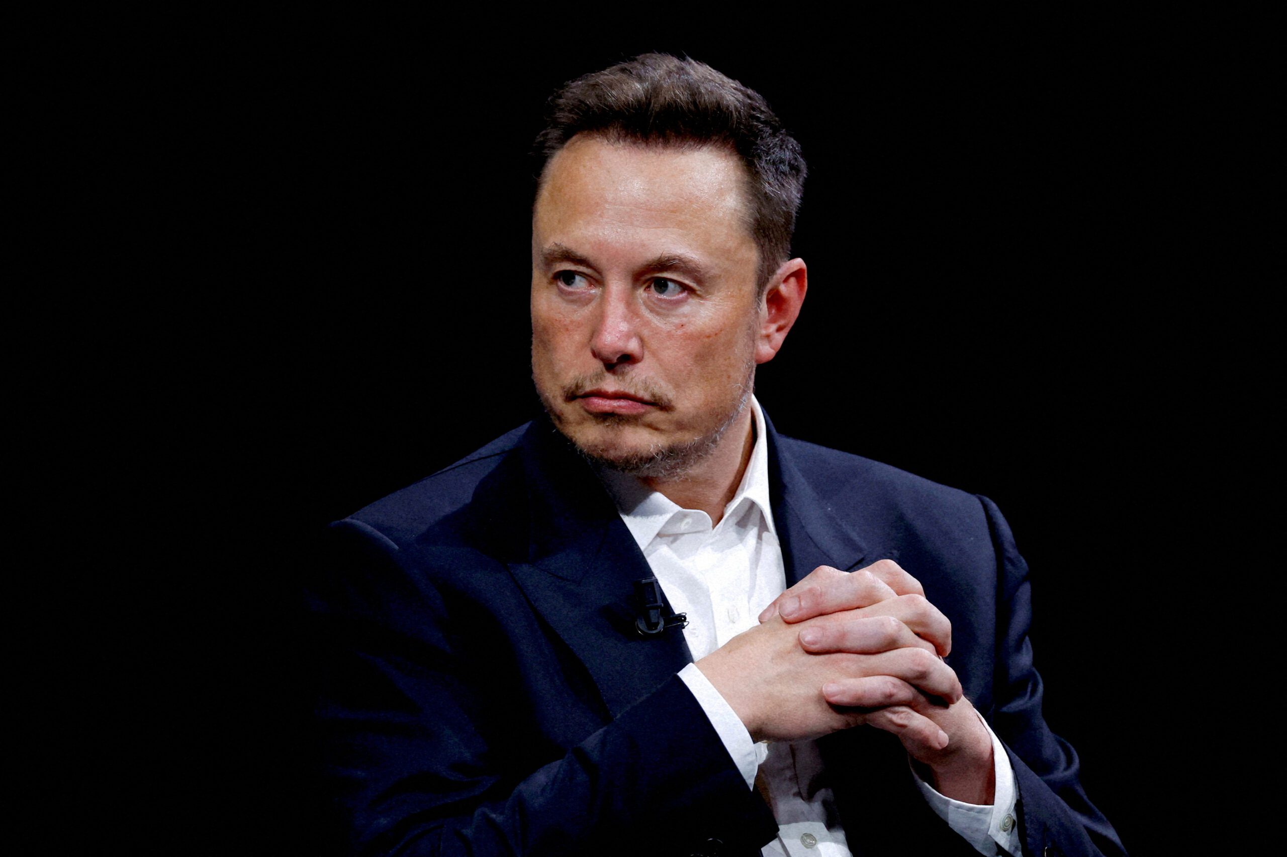 FILE PHOTO: FILE PHOTO: Elon Musk, CEO of SpaceX and Tesla and owner of X, formerly known as Twitter, attends the Viva Technology conference dedicated to innovation and startups at the Porte de Versailles exhibition centre in Paris, France, June 16, 2023. REUTERS/Gonzalo Fuentes/File Photo/File Photo - RC2N26AU68Q3