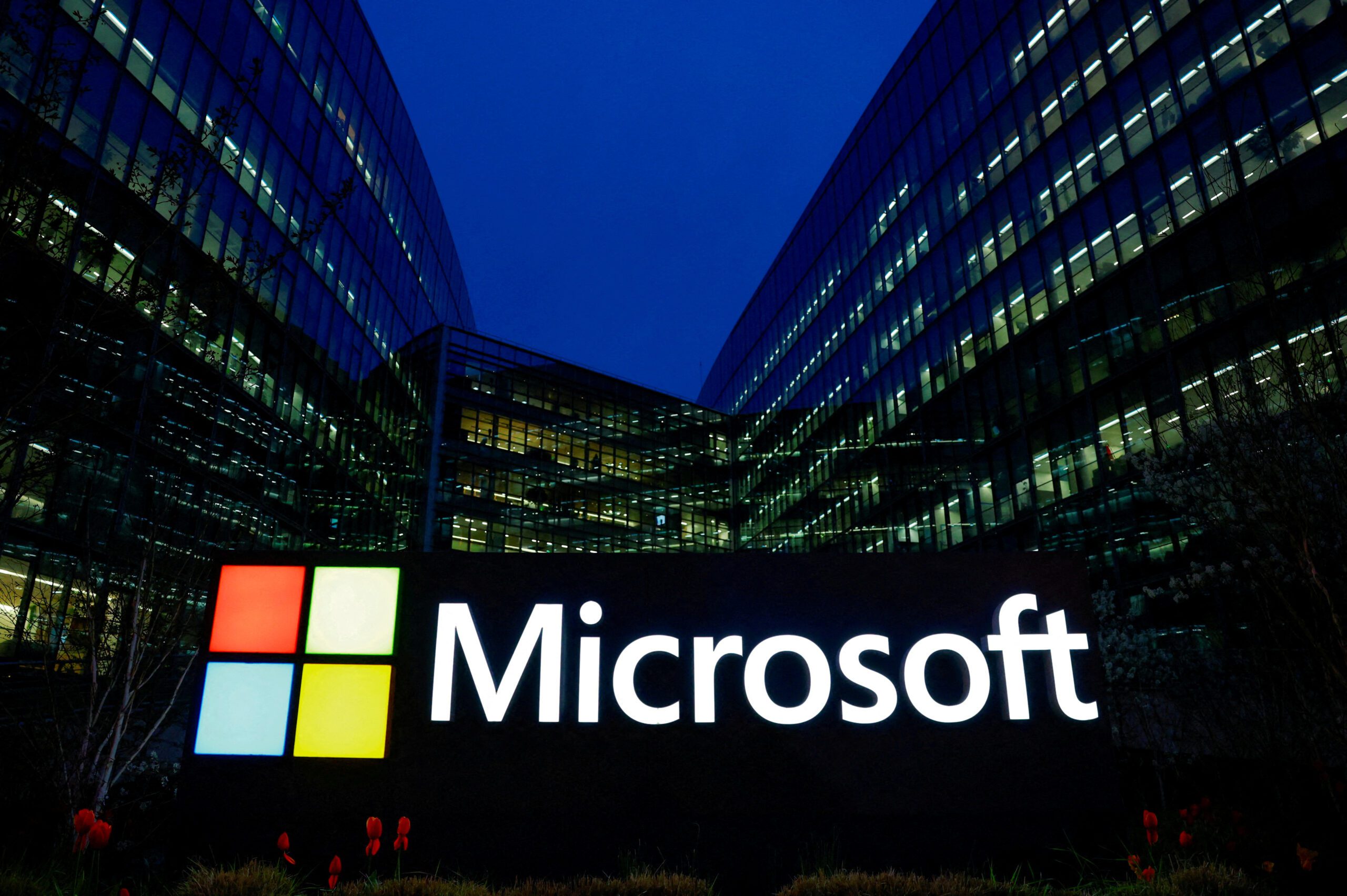 FILE PHOTO: A view shows a Microsoft logo at Microsoft offices in Issy-les-Moulineaux near Paris, France, March 25, 2024. REUTERS/Gonzalo Fuentes/File Photo