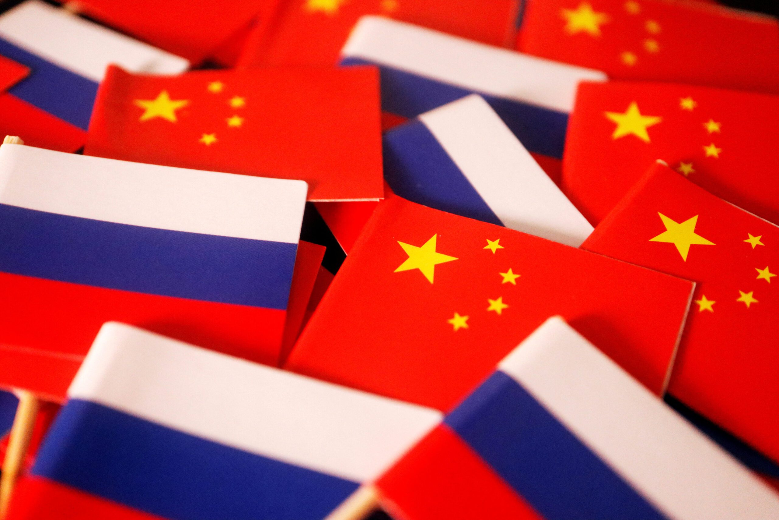 FILE PHOTO: Flags of China and Russia are displayed in this illustration picture taken March 24, 2022. REUTERS/Florence Lo/Illustration/File Photo