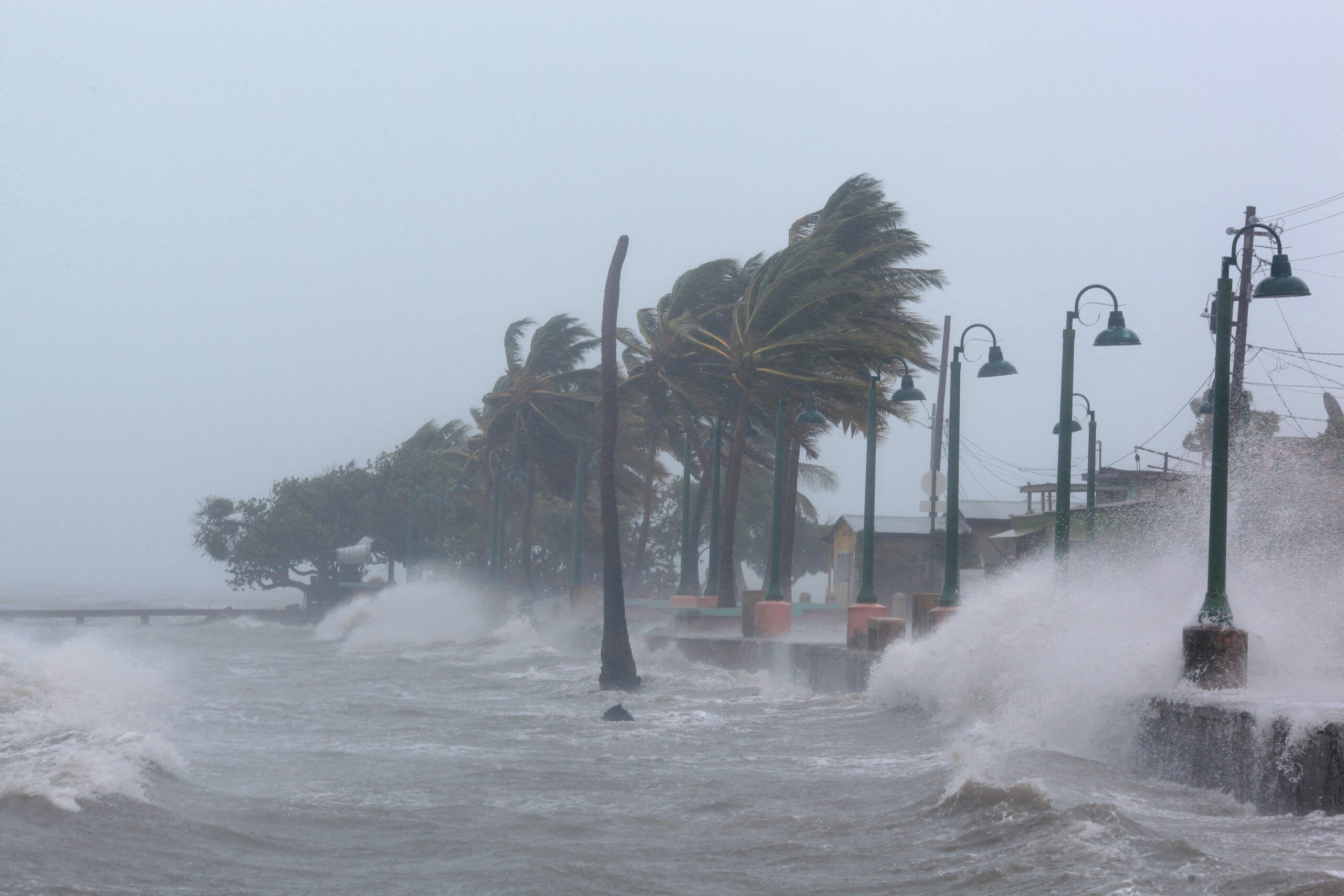 FILE PHOTO: Waves crash against the seawall as Hurricane Irma slammed across islands in the northern Caribbean on Wednesday, in Fajardo, Puerto Rico September 6, 2017.  REUTERS/Alvin Baez/File Photo