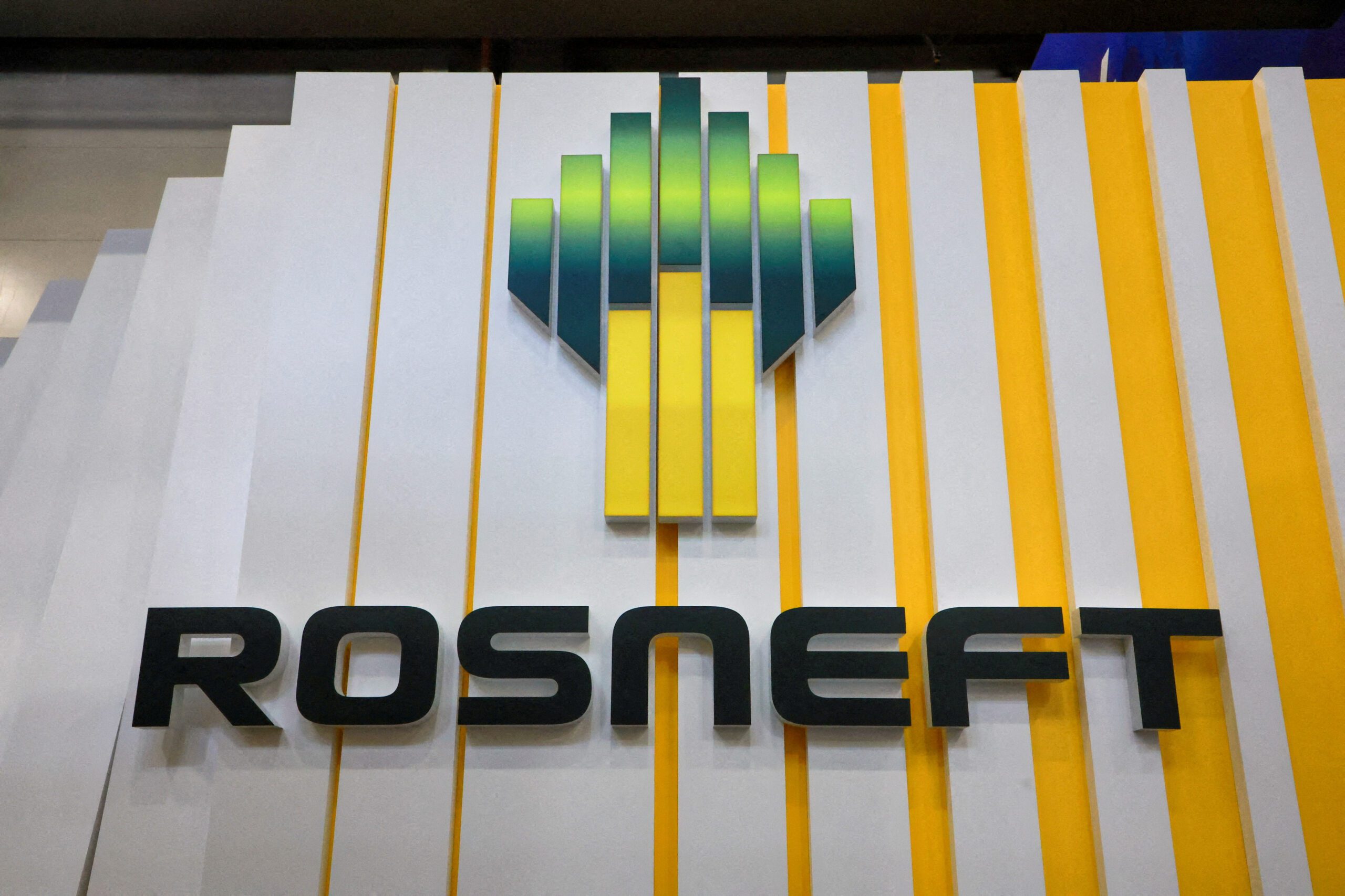 FILE PHOTO: A view shows a board with the logo of Russia's oil producer Rosneft at the St. Petersburg International Economic Forum (SPIEF) in Saint Petersburg, Russia June 5, 2024. REUTERS/Anton Vaganov/File Photo