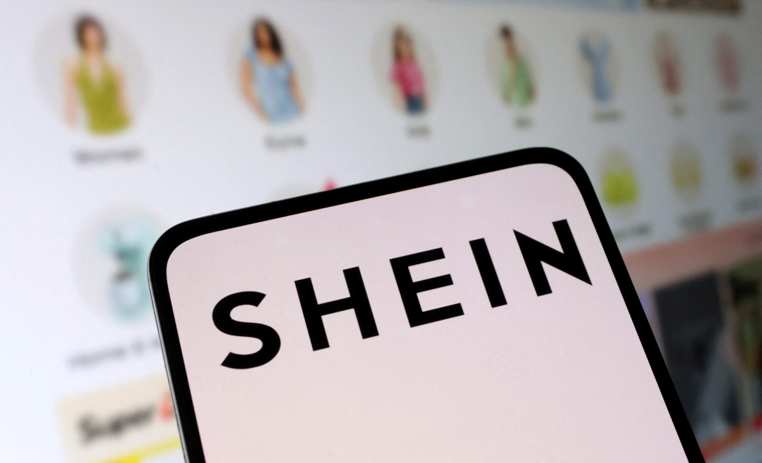 Shein logo and their web shop are seen in this illustration taken, May 16, 2024. REUTERS/Dado Ruvic/Illustration