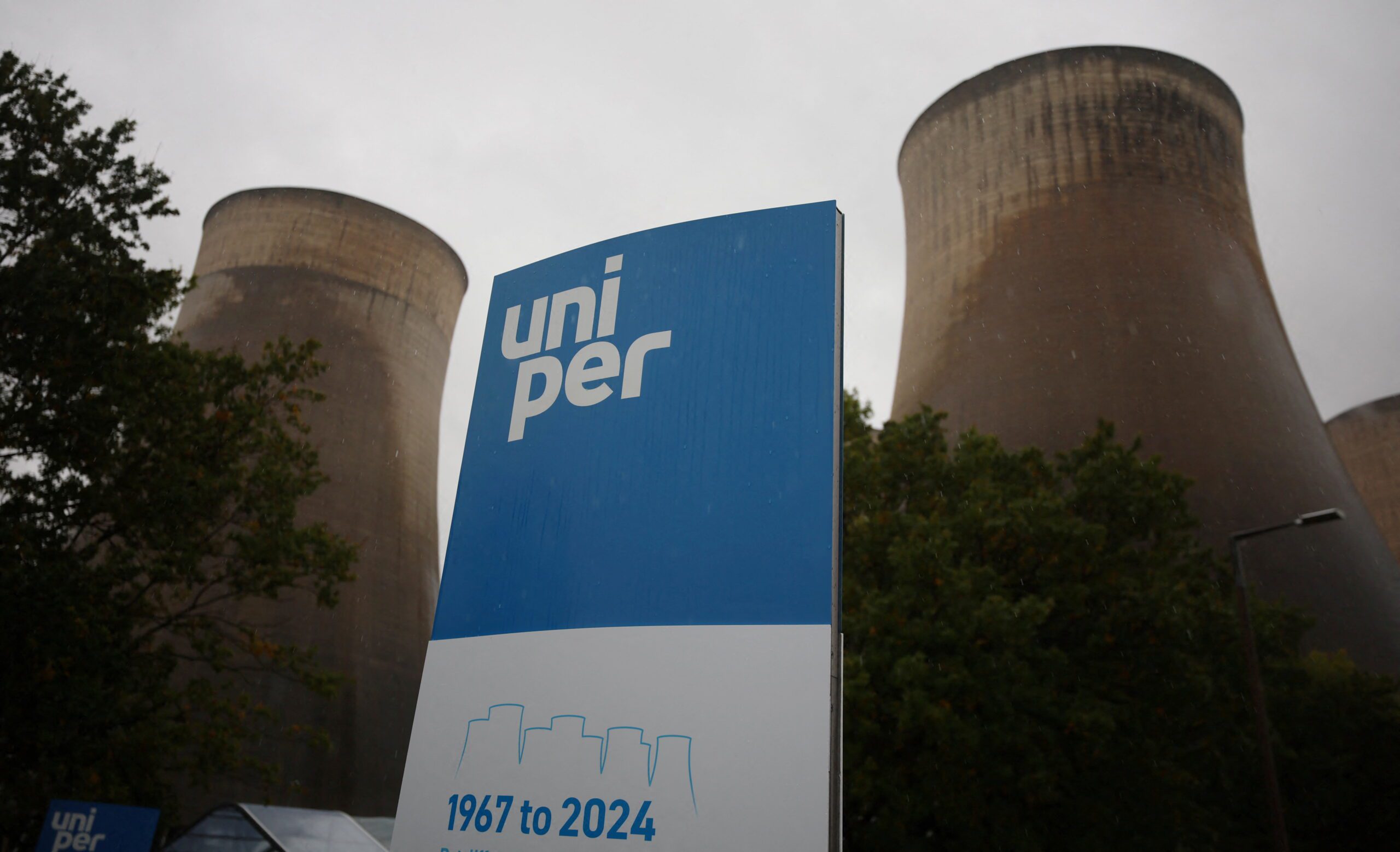 Signage is seen in front of the cooling towers at Uniper's Ratcliffe-on-Soar power station the day after it was taken offline, in Ratcliffe-on-Soar, Britain, October 1, 2024. REUTERS/Phil Noble